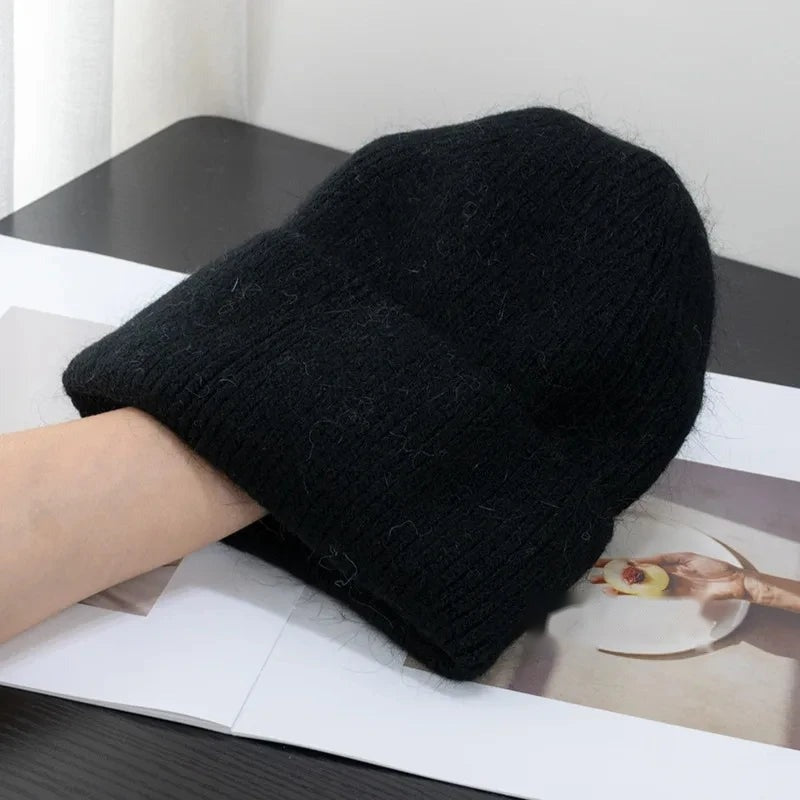 Black fleece-lined knit beanie with fold-up cuff