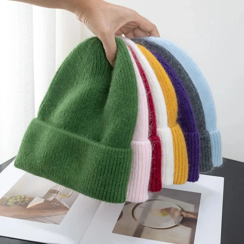 Knit beanies in a range of colours - available in Black, Grey, Dark Green, Light Pink and Light Purple