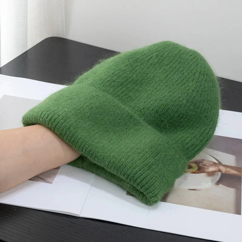 Dark green fleece-lined knit beanie with fold-up cuff