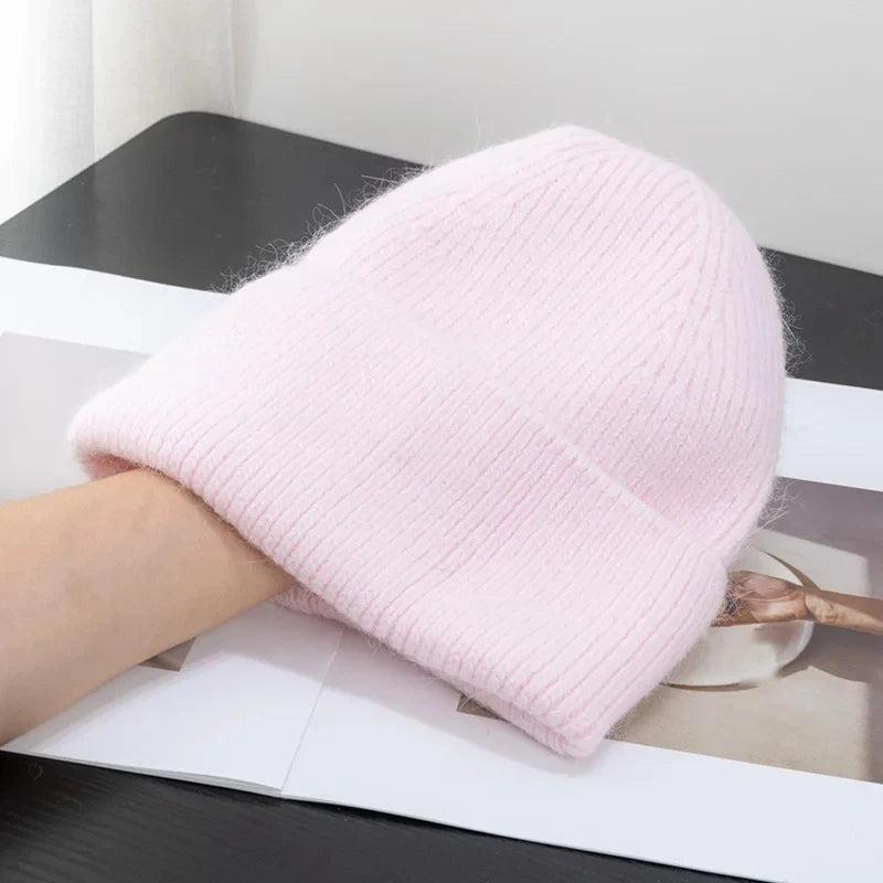 Light pink fleece-lined knit beanie with fold-up cuff